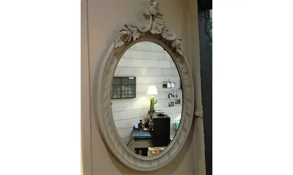 Miroir ovale patiné